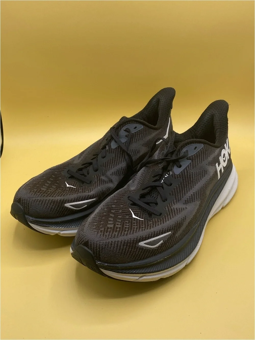 HOKA Clifton 9 in black and white